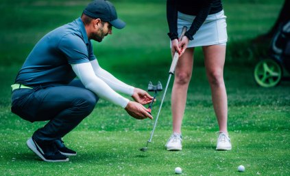 golf-putting-two-young-ladies-practicing-putting-2023-11-27-04-55-09-utc.jpg