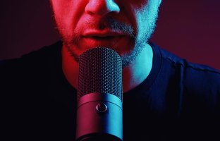 man-recording-podcast-with-studio-microphone-2023-11-27-05-35-20-utc.jpg