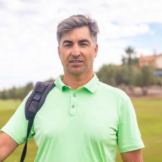 portrait-of-a-man-playing-golf-together-with-the-c-2023-11-27-05-33-40-utc.jpg